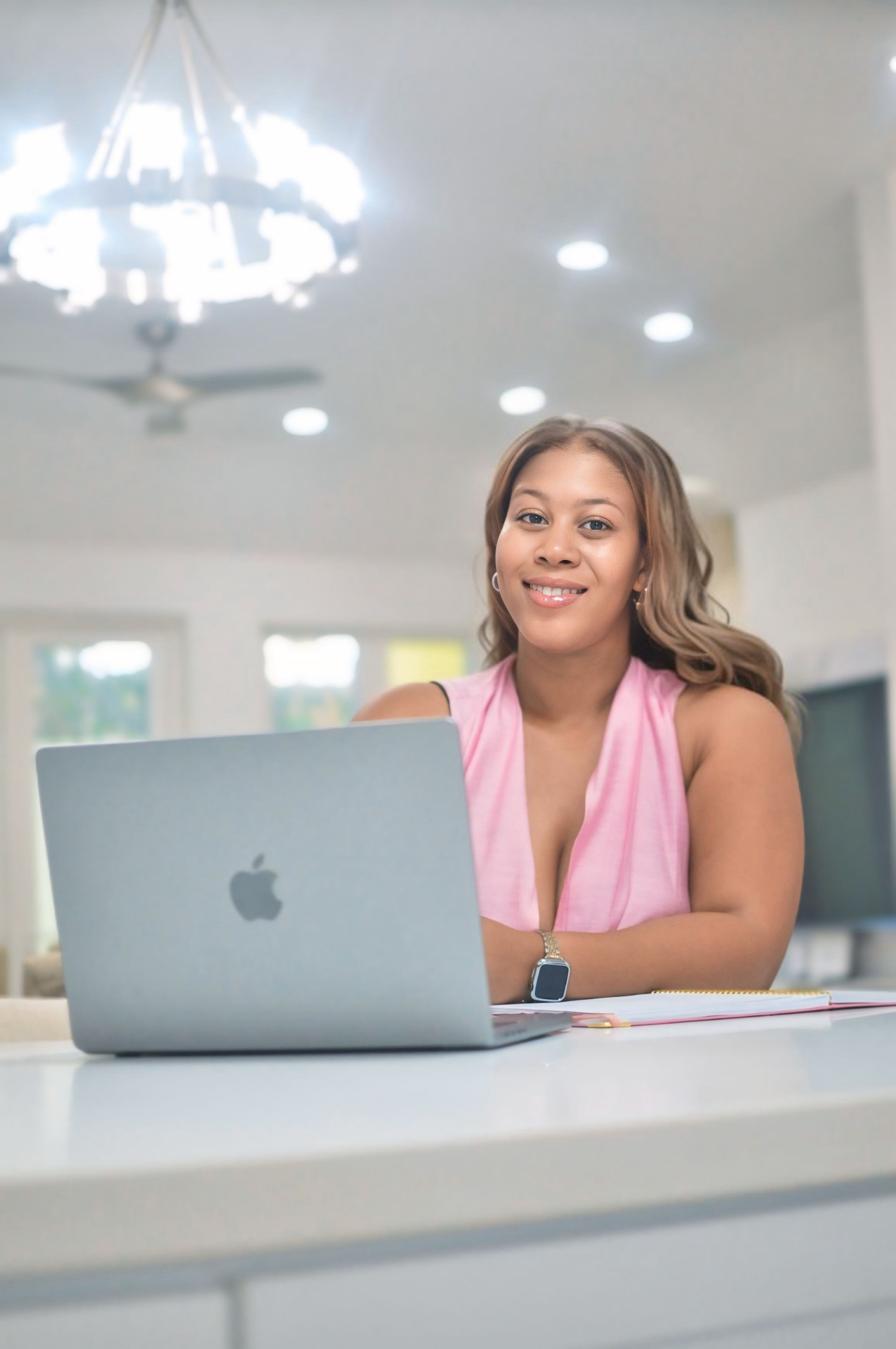 Toni Wright working on her laptop